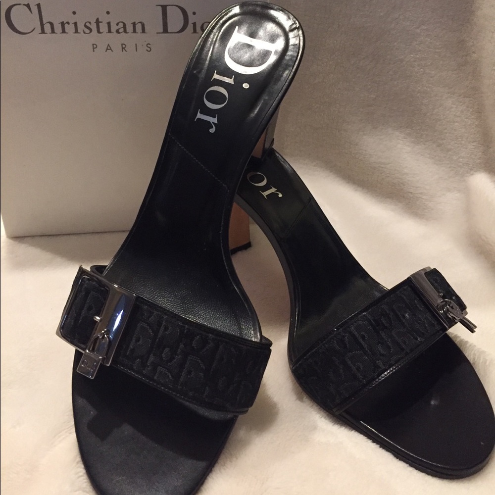 Dior mules in black jacquard with silver hardware.